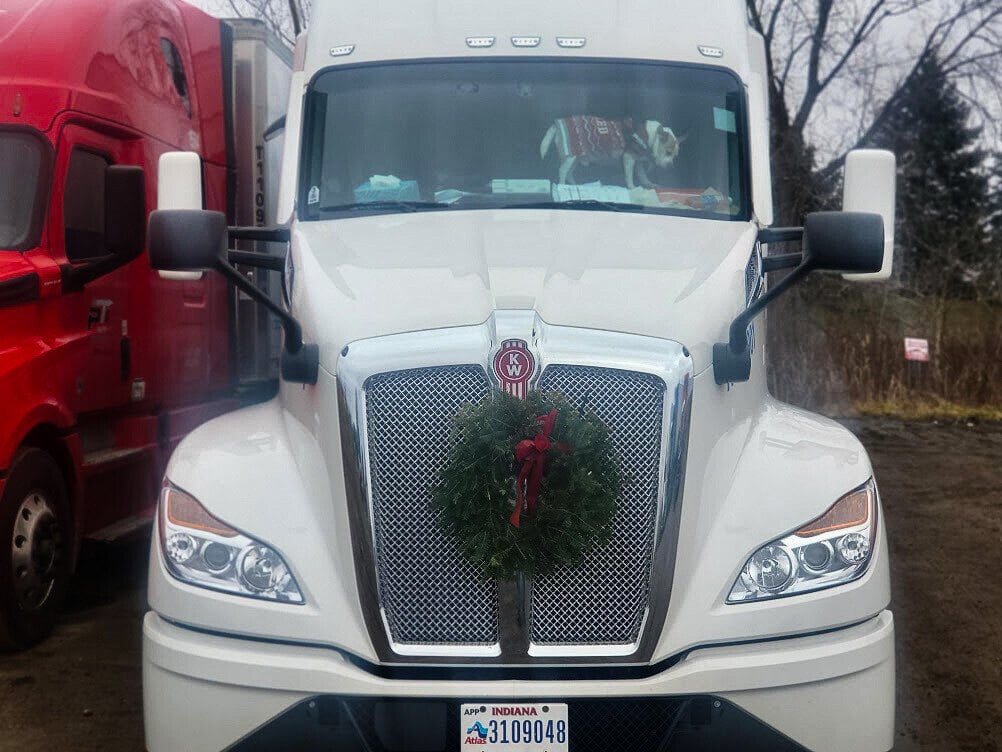 Truck with Christmas wreath on the front