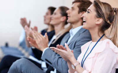 Justification-Packet-Card-clapping-attendees